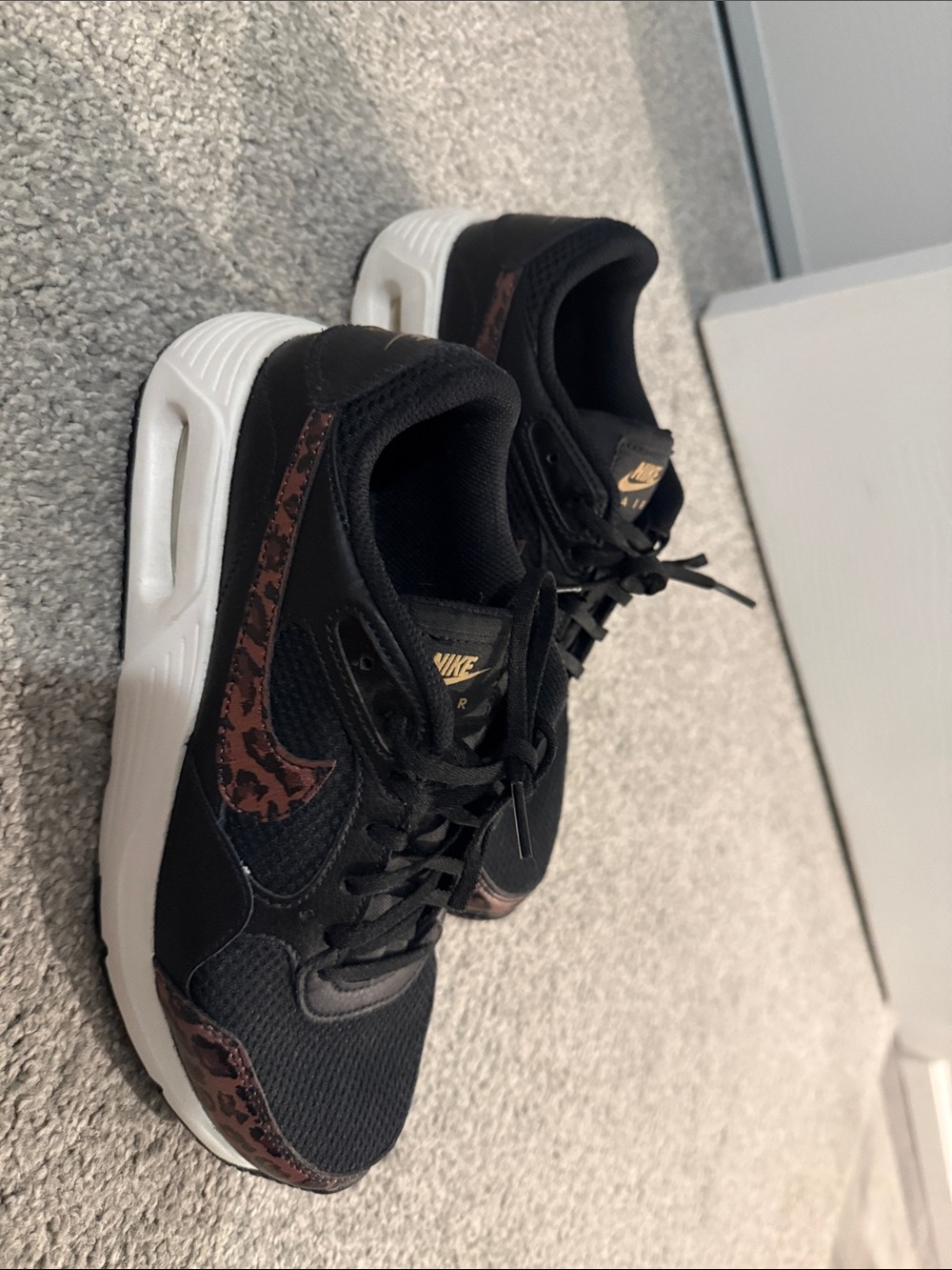 Nike Black Sneakers with Brown Camo Swoosh